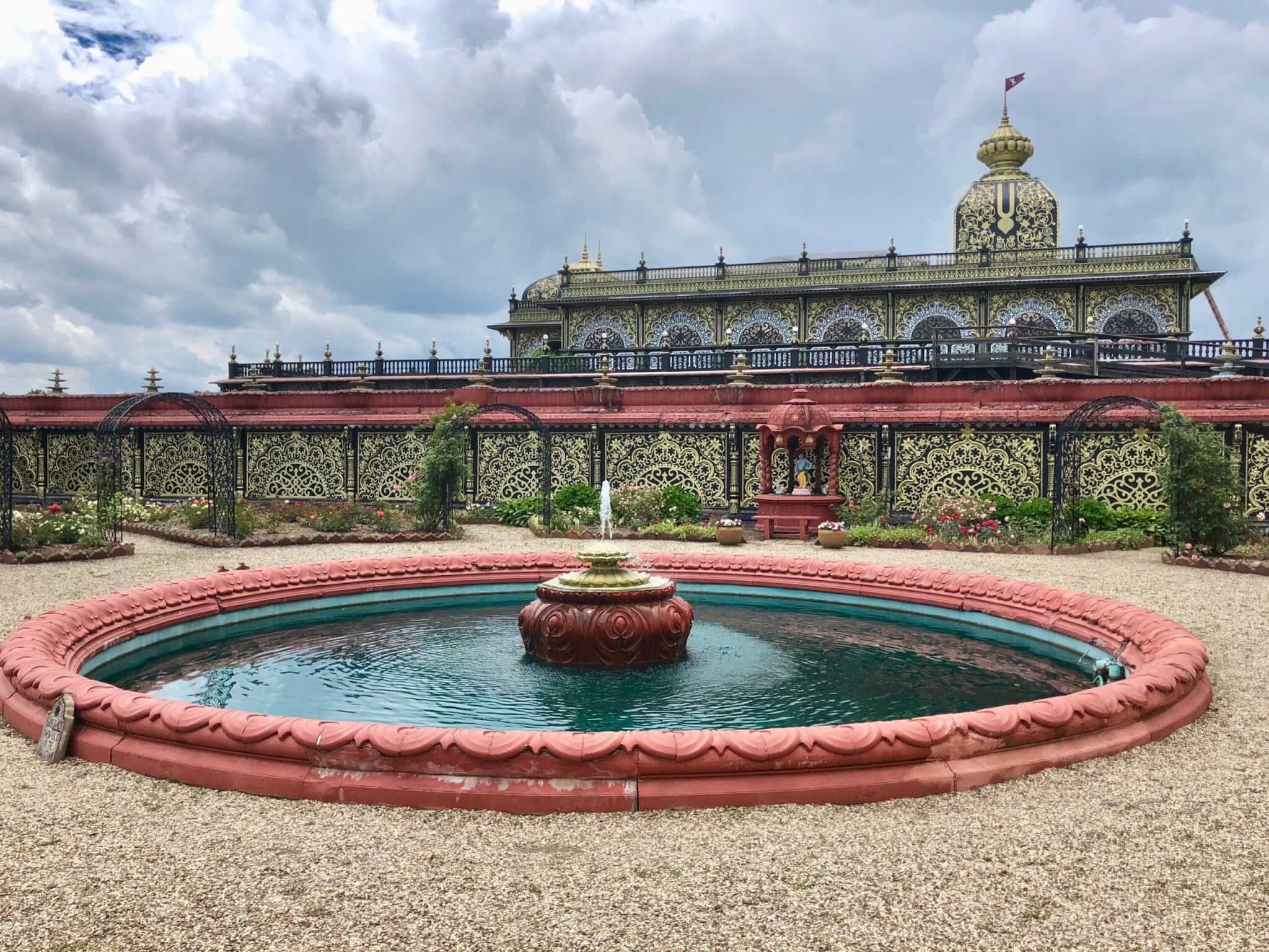 palace of gold with fountain in front